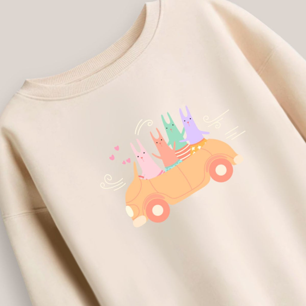 buzo_conejos_en_un_coche_beige_2