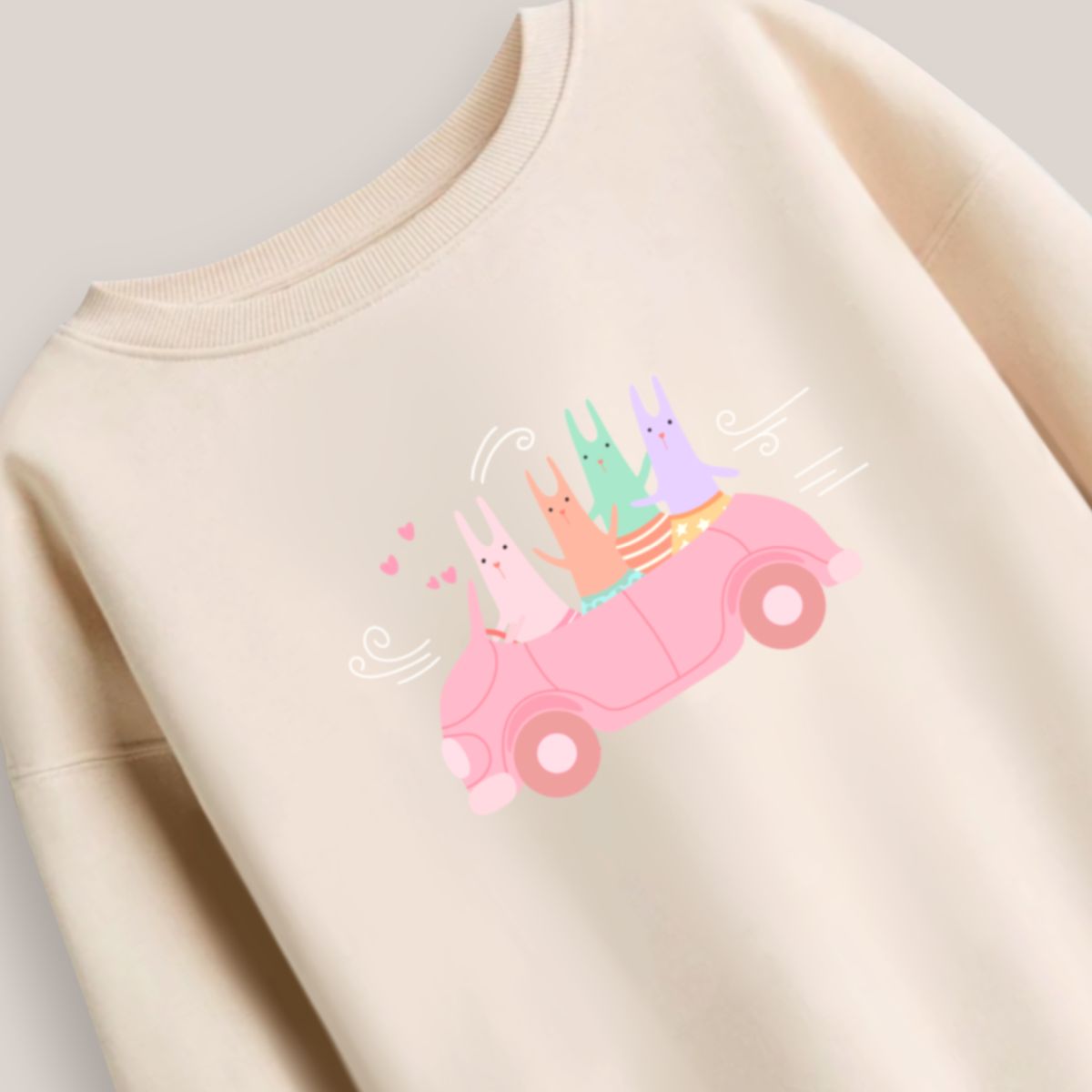 buzo_conejos_en_un_coche_rose_beige_2