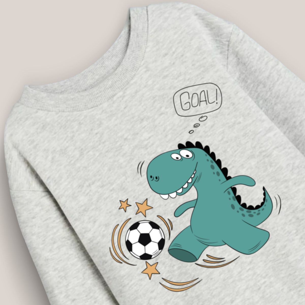 buzo_dino_juega_al_fútbol_gris_2